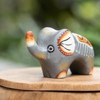 Wood figurine, 'Cute Giant' - Hand-Painted Suar Wood Elephant Figurine Crafted in Bali