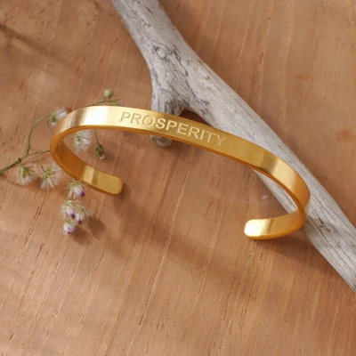 Gold-plated cuff bracelet, 'Prosperous Dawn' - Inspirational 18k Gold-Plated Brass Cuff Bracelet from Bali