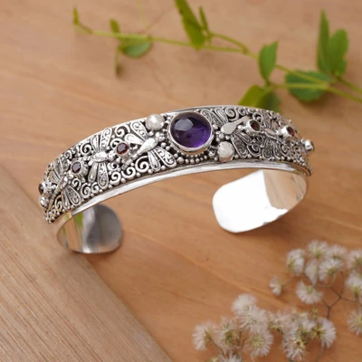 Amethyst and garnet cuff bracelet, 'Dragonfly Arcadia' - Folk Art-Themed Amethyst and Garnet Dragonfly Cuff Bracelet