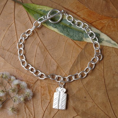 Sterling silver charm bracelet, 'Special Gifts' - High-Polished Sterling Silver Gift-Shaped Charm Bracelet