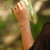 Sterling silver charm bracelet, 'Eternal Candy' - Candy Cane-Themed Sterling Silver Charm Bracelet from Bali