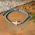 Cotton braided pendant bracelet, 'Fly Like an Eagle' - Cotton Braided Bracelet with Hand-Carved Eagle Pendant