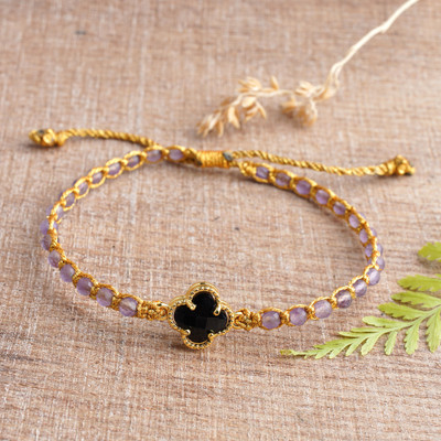Amethyst beaded pendant bracelet, 'Flower of Wisdom' - Amethyst Beaded Bracelet with Black Flower Pendant from Bali