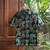 Men's hand-stamped batik cotton shirt, 'Jungle Fever' - Men's Palm-Patterned Dark Grey and Green Batik Cotton Shirt