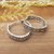 Sterling silver hoop earrings, 'The Era of Flowers' - Balinese-Made Flower-Patterned Sterling Silver Hoop Earrings