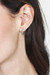 Sterling silver hoop earrings, 'The Era of Flowers' - Balinese-Made Flower-Patterned Sterling Silver Hoop Earrings