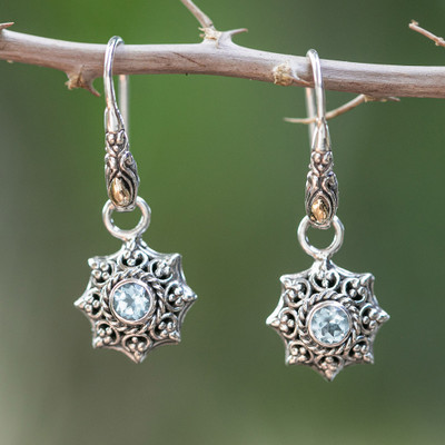 Gold-accented blue topaz dangle earrings, 'Wise Sunshine Spirit' - Sun-Inspired Gold-Accented Blue Topaz Silver Dangle Earrings