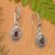 Gold-accented garnet dangle earrings, 'Floral Magic' - Flower-Shaped Garnet Silver Dangle Earrings with Gold Accent