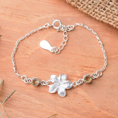 Citrine pendant bracelet, 'Sparkling Plumeria' - Plumeria-Themed Silver Pendant Bracelet with Citrine Gems