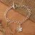 Sterling silver pendant bracelet, 'Snowy Jasmine' - Sterling Silver Bracelet with Jasmine-Shaped Pendant