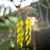 Wood and glass wind chime, 'Sunset Rhythm' - Leaf-Shaped Handcrafted Yellow Green Glass Wood Wind Chime