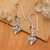 Garnet dangle earrings, 'Holy Flowers' - Floral Silver Dangle Earrings with Faceted Garnet Gemstones