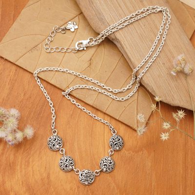 Blue topaz pendant necklace, 'Botanical Bliss' - Blue Topaz Silver Pendant Necklace with Vine Theme from Bali