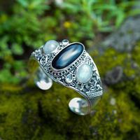 Multi-gemstone cuff bracelet, 'Sun and Moon Luxury' - Sun-Themed Onyx Rainbow Moonstone Blue Topaz Cuff Bracelet