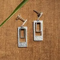 Sterling silver dangle earrings, 'Abstrac Chances' - Modern Polished and Textured Sterling Silver Dangle Earrings