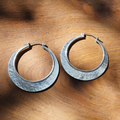 Sterling silver hoop earrings, 'Moon & Modernity' - Hammered and Polished Sterling Silver Moon Hoop Earrings