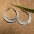 Sterling silver hoop earrings, 'Moon & Modernity' - Hammered and Polished Sterling Silver Moon Hoop Earrings