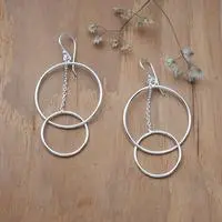 Sterling silver dangle earrings, 'Divine Hoops' - Sterling Silver Dangle Earrings with Double Circle Motif