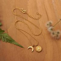 Gold-plated pendant necklace, 'Celestial Charm' - Gold-Plated Necklace with Sun Crescent Moon Dual Pendants
