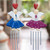 Wood and natural fiber wind chimes, 'Smiling Fairies' (pair) - 2 Blue Purple Wood and Natural Fiber Fairy Wind Chimes (image 2) thumbail