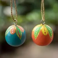 Wood ornaments, 'Colorful Holiday Globes' (pair) - Pair of Hand-Carved Painted Wood Globe Christmas Ornaments