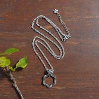 Sterling silver pendant necklace, 'Petals from Gianyar' - Artisan-Made Floral Oxidized and Polished Pendant Necklace