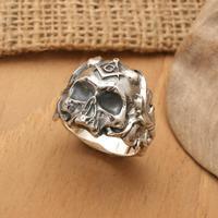 Men's sterling silver cocktail ring, 'Leafy Skull' - Men's Sterling Silver Skull Cocktail Ring with Vine Patterns