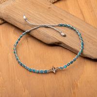 Gold-accented apatite pendant bracelet, 'Inner Ocean' - Adjustable Blue Apatite Pendant Bracelet with Golden Accents