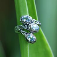 Blue topaz multi-stone cocktail ring, 'Tranquility Roots' - Silver Cocktail Ring with Three Oval Blue Topaz Gemstones