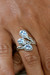 Blue topaz multi-stone cocktail ring, 'Tranquility Roots' - Silver Cocktail Ring with Three Oval Blue Topaz Gemstones