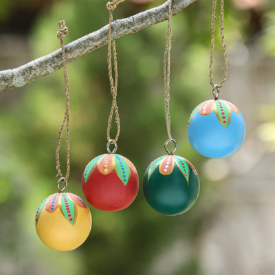 Wood ornaments, 'Colorful Holiday Globes' (set of 4) - Hand-Painted Wood Globe Christmas Ornaments (Set of 4)
