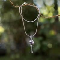 Gold-accented amethyst and garnet pendant necklace, 'Key of Memory' - 1-Carat Faceted Amethyst and Garnet Key Pendant Necklace