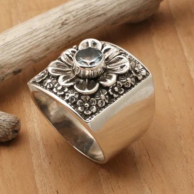 Blue topaz cocktail ring, 'Spring in Paradise' - Oxidized and Polished Floral Round Blue Topaz Cocktail Ring