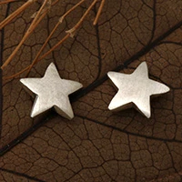 Sterling silver stud earrings, 'Striking Star' - Star-Themed Silver Stud Earrings with Matte Finish from Bali