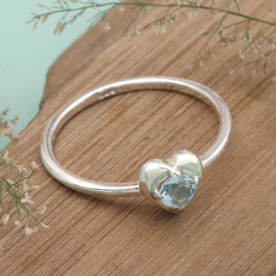 Blue topaz band ring, 'United by Love' - Heart-Themed Blue Topaz Sterling Silver Band from Java