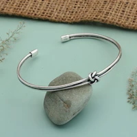 Sterling silver cuff bracelet, 'Universe Knot' - Minimalist Sterling Silver Cuff Bracelet Crafted in Bali