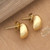 Gold-plated stud earrings, 'Hatching Glory' - Whimsical High-Polished Egg-Shaped Gold-Plated Stud Earrings (image 2c) thumbail