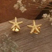 Gold-plated stud earrings, 'Golden Shore' - Ocean-Themed 18k Gold-Plated Brass Starfish Stud Earrings