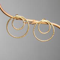 Gold-plated drop earrings, 'Hoops of Harmony' - Gold-Plated Silver Double-Circle Hammered Drop Earrings