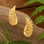 Gold-plated button earrings, 'Fly to Me' - Wing-Themed Textured 22k Gold-Plated Brass Button Earrings (image 2) thumbail