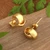 Gold-plated stud earrings, 'Knot of the Universe' - 22k Gold-Plated Brass Stud Button Earrings with Knot Motif (image 2c) thumbail