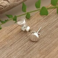 Sterling silver stud earrings, 'Dainty Charm' - Polished Sterling Silver Stud Earrings Crafted in Bali