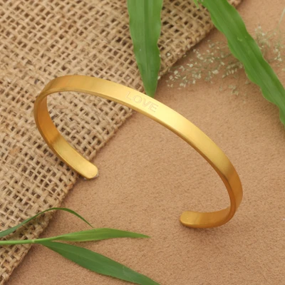 Gold-plated cuff bracelet, 'Lovely Dawn' - Minimalist 18k Gold-Plated Inspirational Love Cuff Bracelet