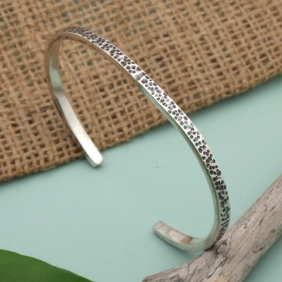 Sterling silver cuff bracelet, 'Charming Charcoal' - Sterling Silver Cuff Bracelet with Etched Accents from Bali