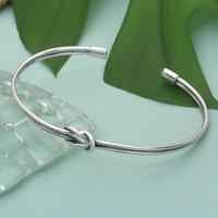 Sterling silver cuff pendant bracelet, 'Eternal Knot' - Modern Silver Cuff Bracelet with Infinity Symbol Knot Motif