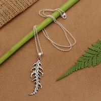 Sterling silver pendant necklace, 'Oxidized Spruce' - Forest-Themed Oxidized Spruce Tree Leaf Pendant Necklace