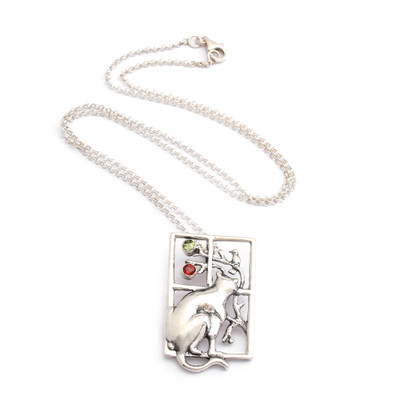 Garnet and peridot pendant necklace, 'Feline Window' - Cat-Inspired Natural Garnet and Peridot Pendant Necklace