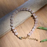 Gold-accented rose quartz beaded link bracelet, 'Strawberry Gin' - Gold-Accented Link Bracelet with Knotted Rose Quartz Stones