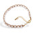 Gold-accented rose quartz beaded link bracelet, 'Strawberry Gin' - Gold-Accented Link Bracelet with Knotted Rose Quartz Stones (image 2d) thumbail
