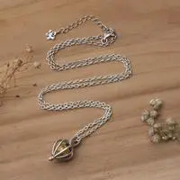 Gold-accented pendant necklace, 'Beautiful Bud' - Gold-Accented Silver Pendant Necklace with Floral Bud Motif